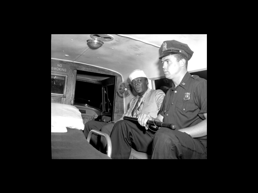 Miles Davis in a police van after being arrested and beaten